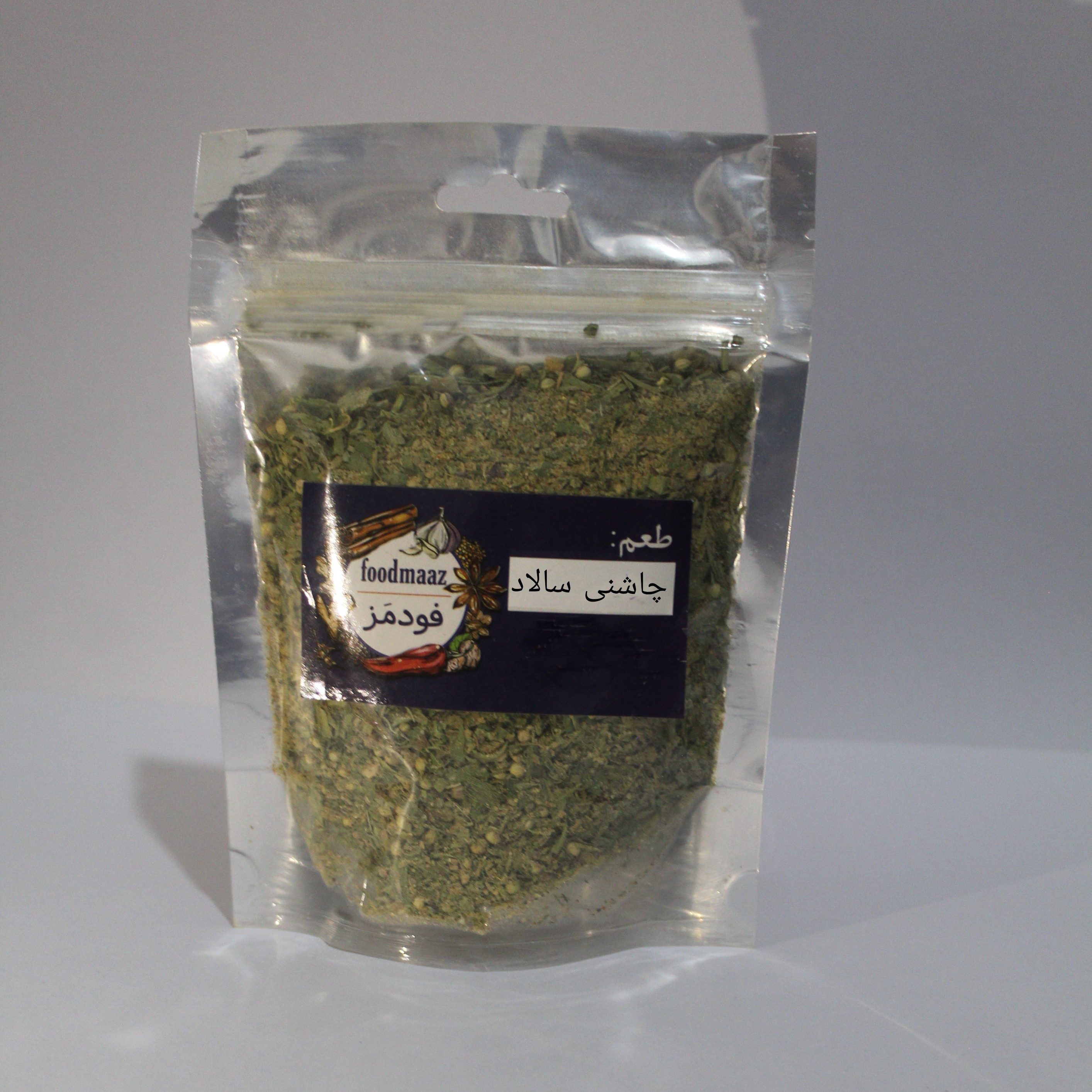 چاشنی سالاد 70 گرمی ترکیبی از سبزیجات معطر خشخاش کنجد کتان ادویه پودر غوره و لیمو